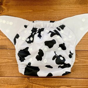 画像2: 「牛柄ホワイト」立ったまま履けるパンツ型ワンサイズおむつ/トレパンにも♪ツルツル (2)